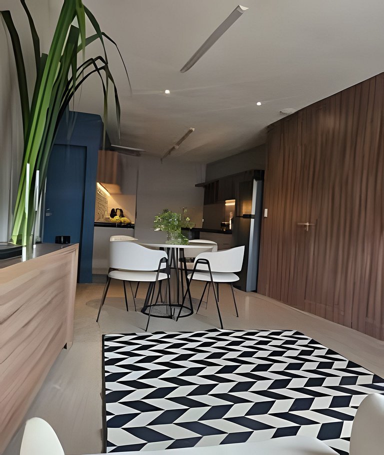 Estúdio 1610 — Quarto de casal e sala, perto de tudo.